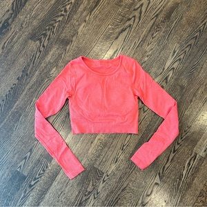 Lululemon ebb to street long sleeve cropped top size 4 coral